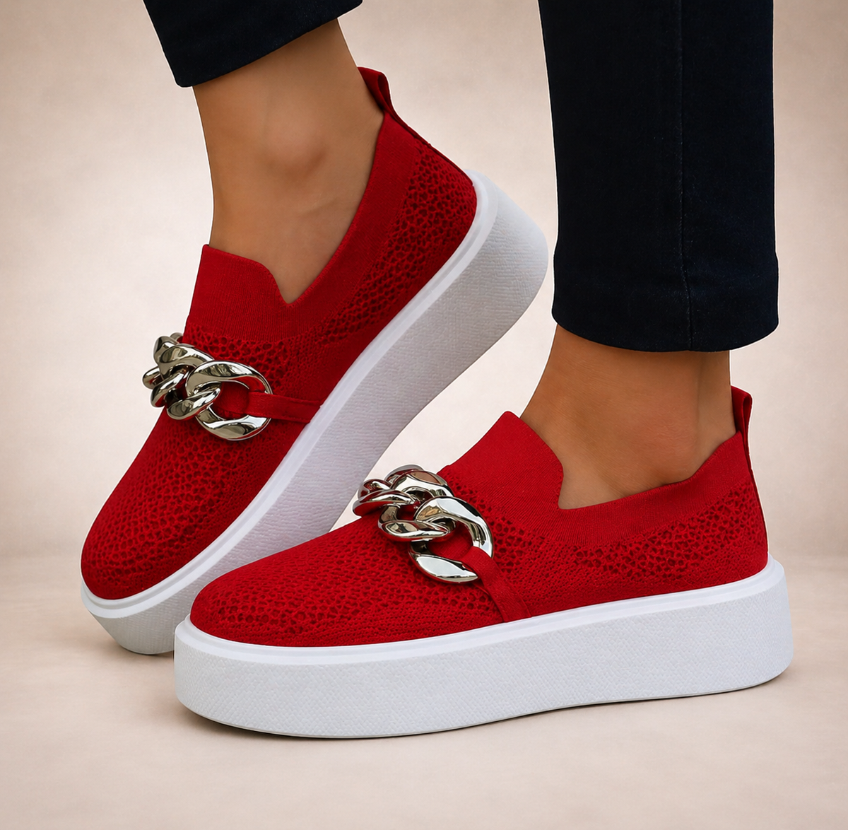 Womens chain-detail slip-on loafers shown in black, camel, white and red
