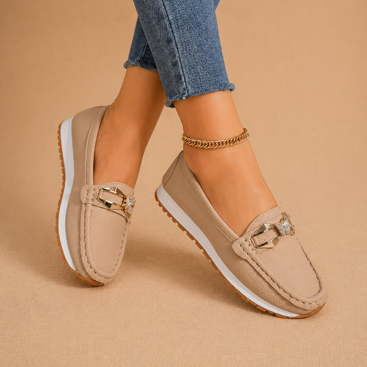 Women's buckle loafers in beige and black, classic slip-on flats