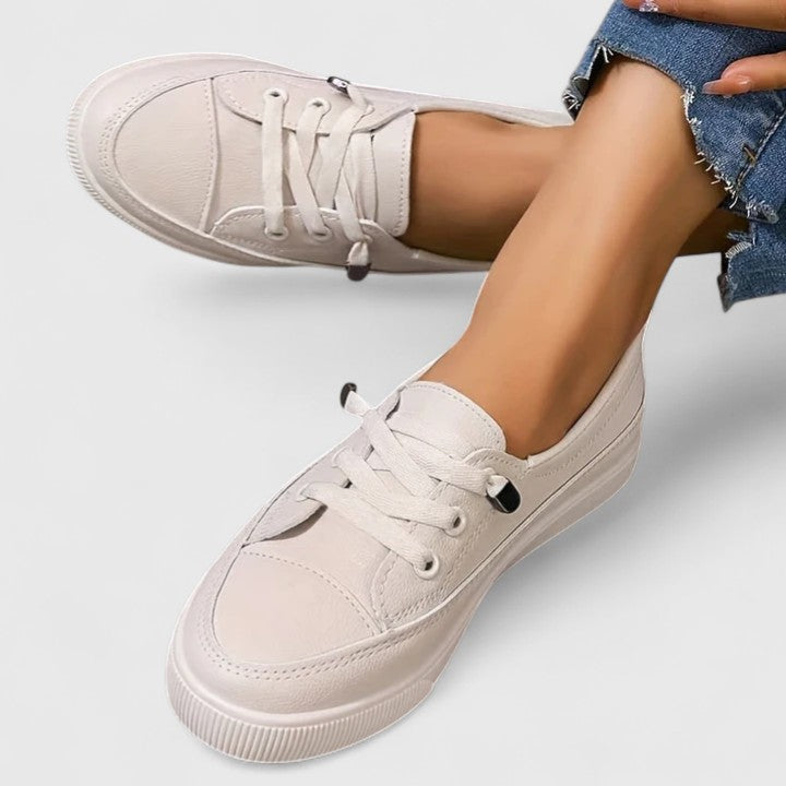 Comfortable slip-on everyday shoes shown in white, black and beige