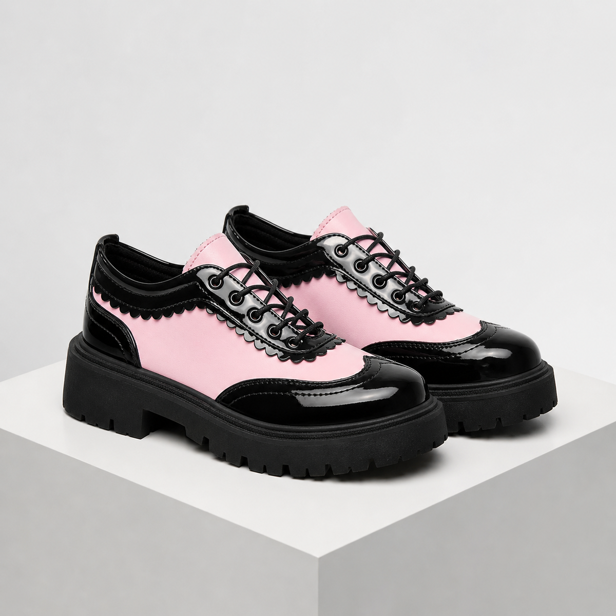 Beatrix wingtip platform oxford shoes with lace-up closure in pink and white