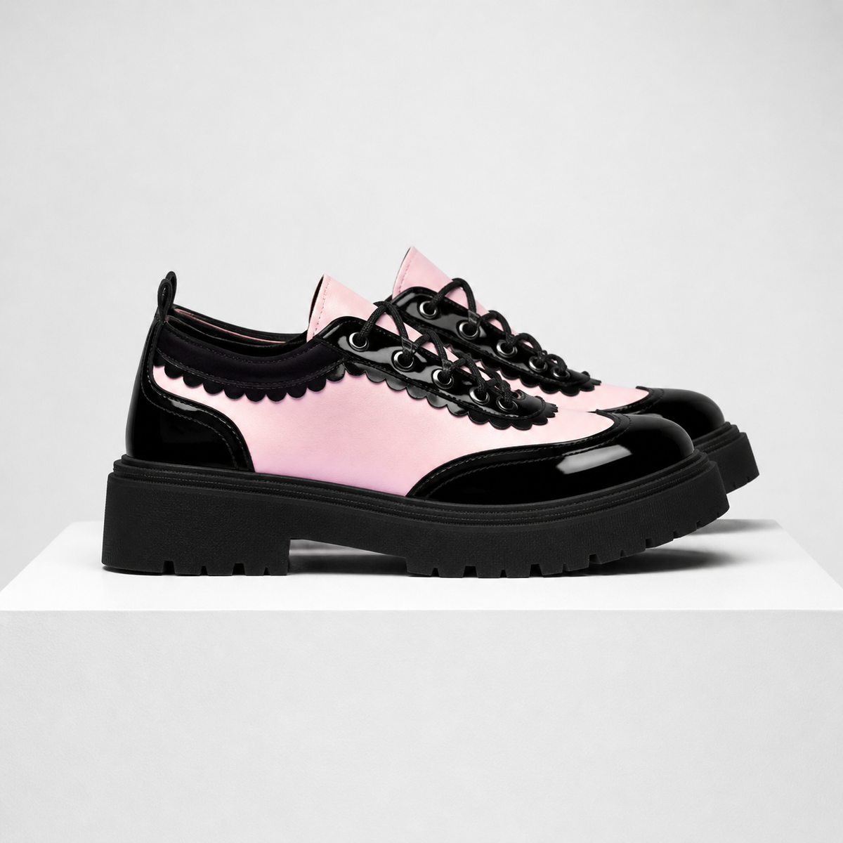 Beatrix wingtip platform oxford shoes with lace-up closure in pink and white