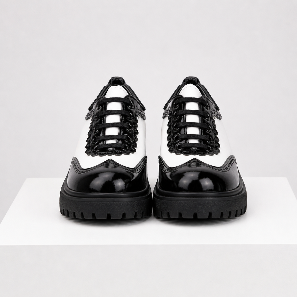 Beatrix wingtip platform oxford shoes with lace-up closure in pink and white