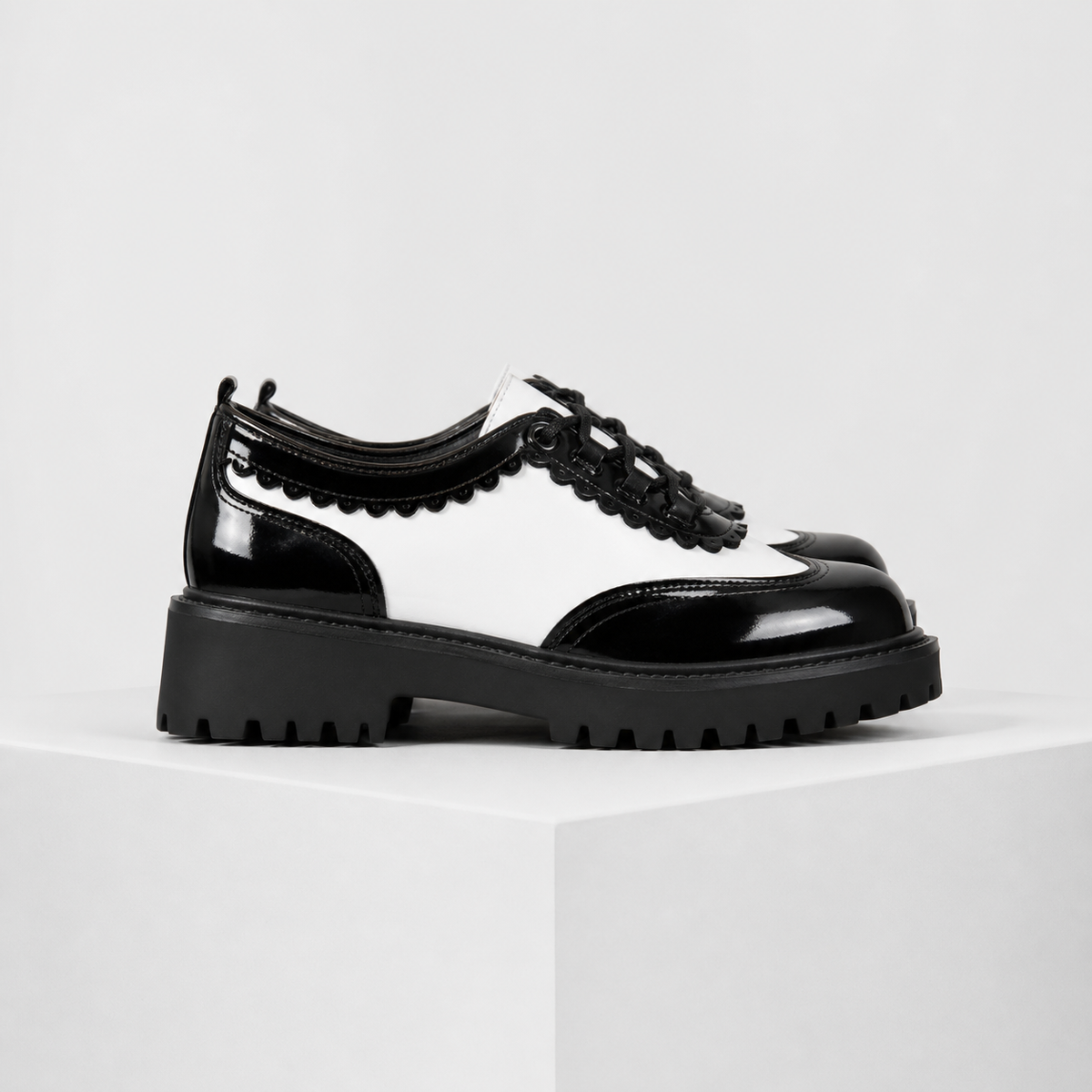 Beatrix wingtip platform oxford shoes with lace-up closure in pink and white
