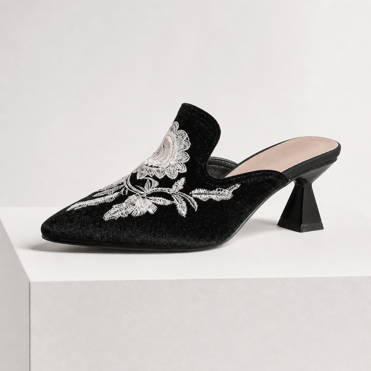 Embroidered velvet pointed-toe mules with floral detail and low flared heel