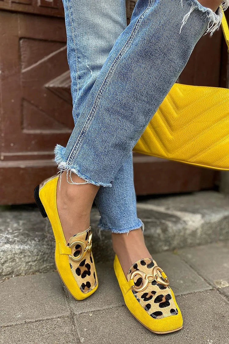 Yellow animal print women's loafers with a classic slip-on silhouette