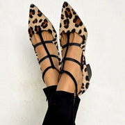 Women's heeled shoes with a leopard-print strap and classic silhouette