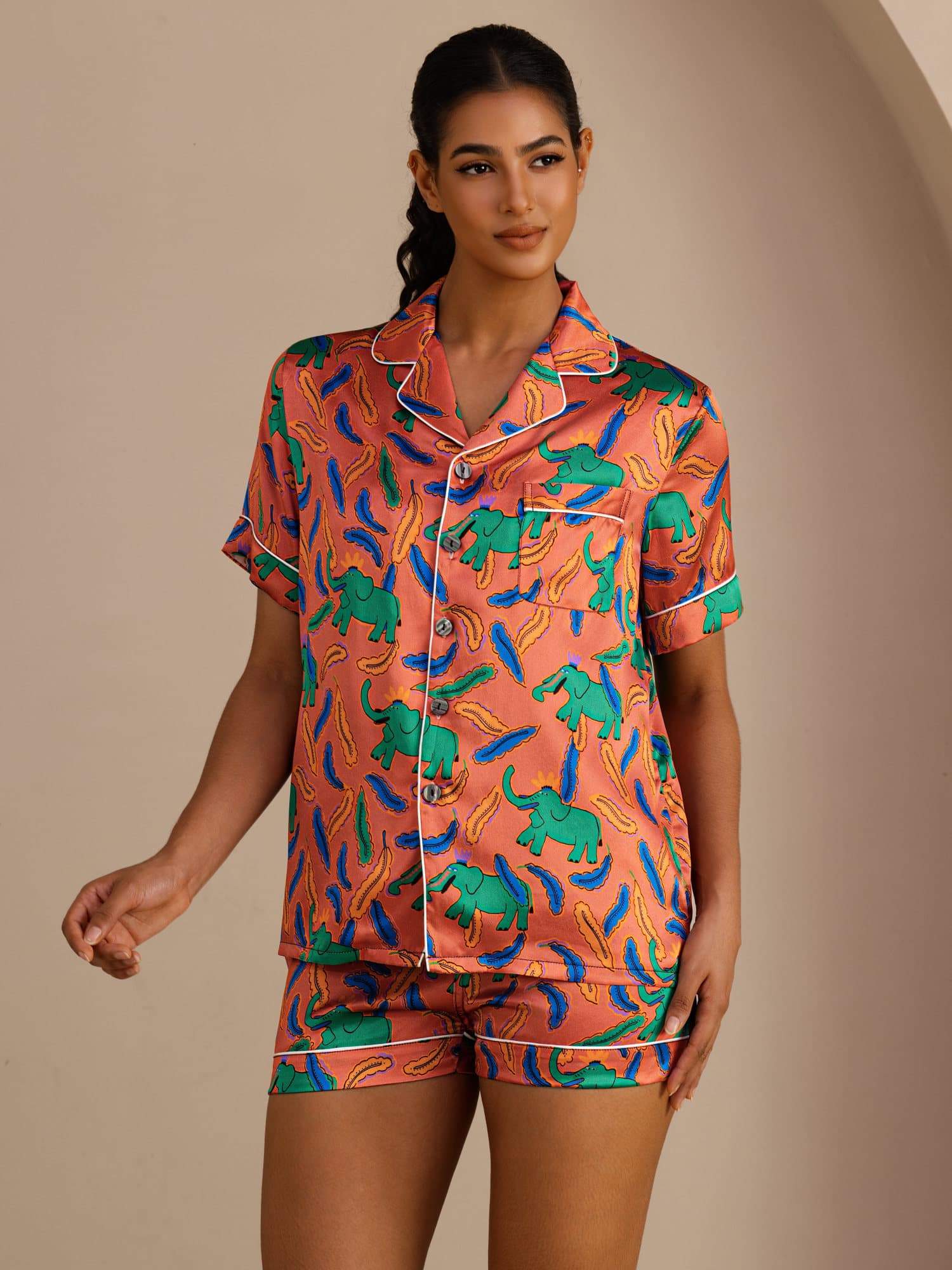Adriana pleated pure silk pyjama set in clay elephant print, coordinated top and trousers