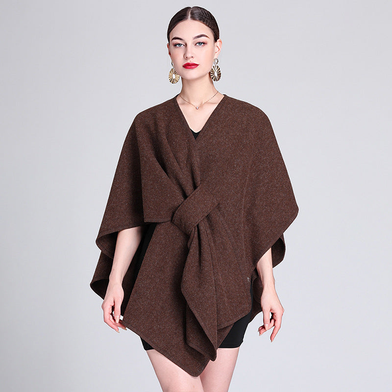 Marina caped fleece shawl draped over the shoulders in a soft neutral tone