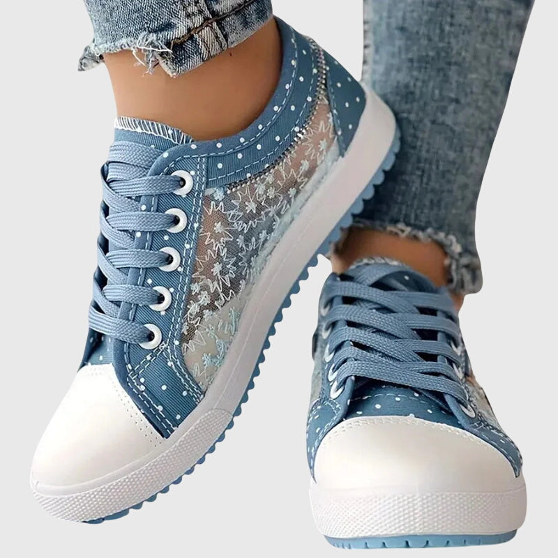 Comfortable lace-up sneakers in soft blue tones for everyday wear
