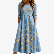 Cecile lightweight floral summer dress with pockets in a soft blue print
