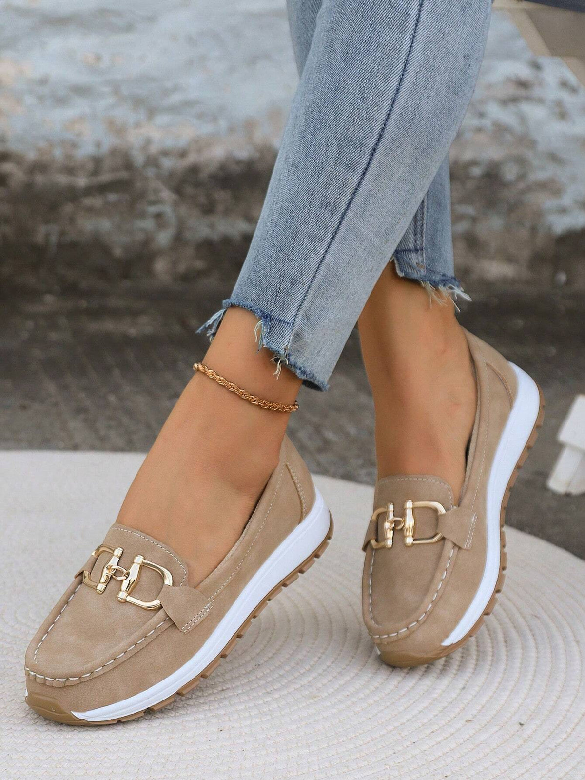 Classic buckle loafers for women shown in khaki, black, blue and grey
