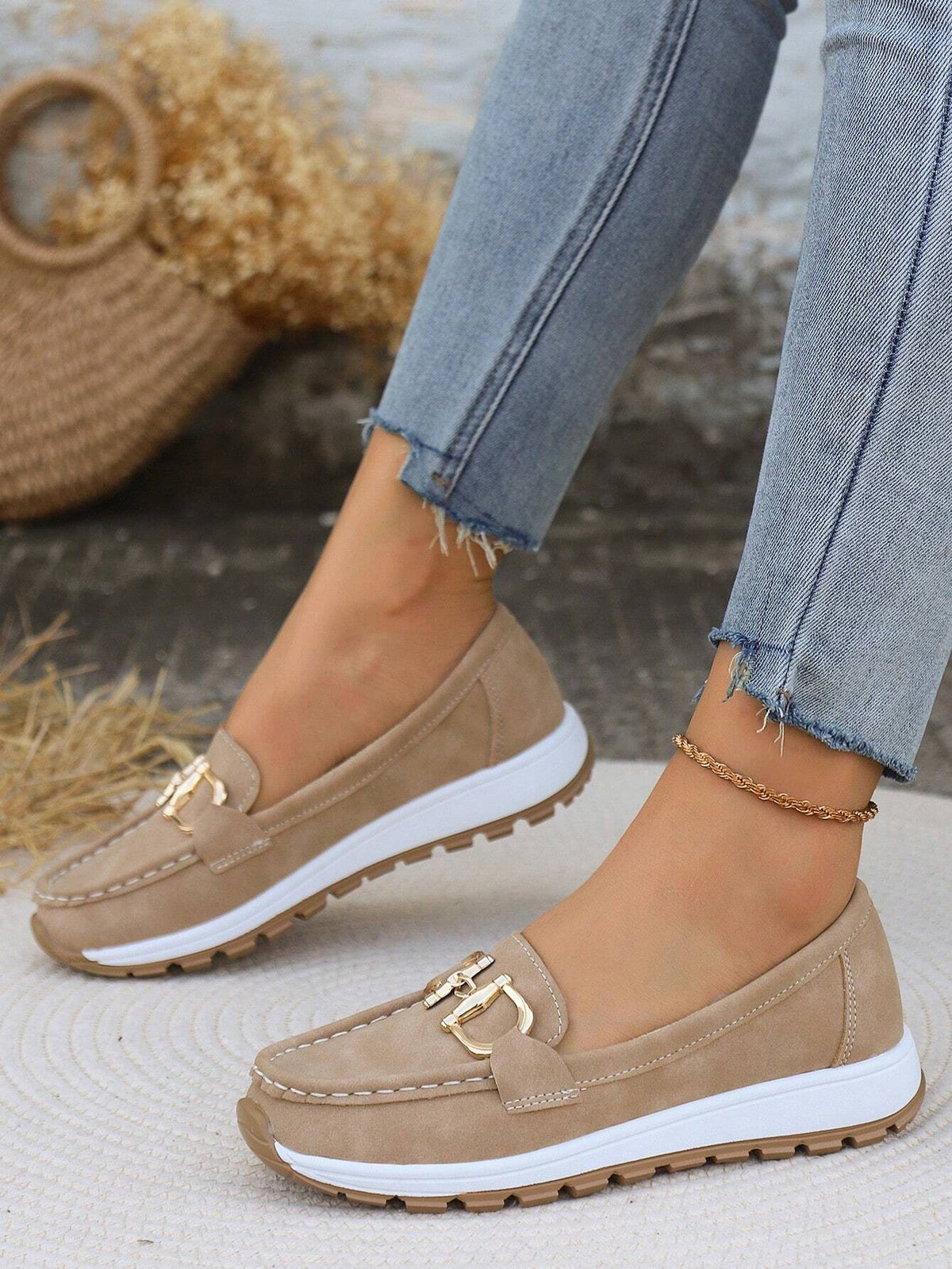 Classic buckle loafers for women shown in khaki, black, blue and grey