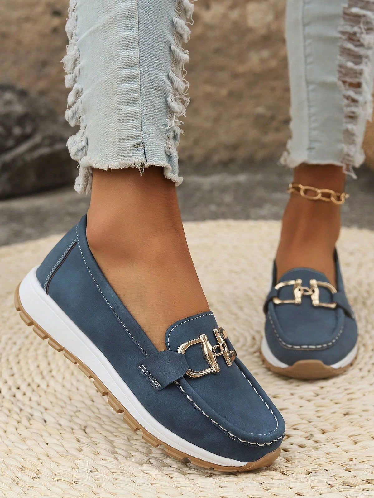 Classic buckle loafers for women shown in khaki, black, blue and grey