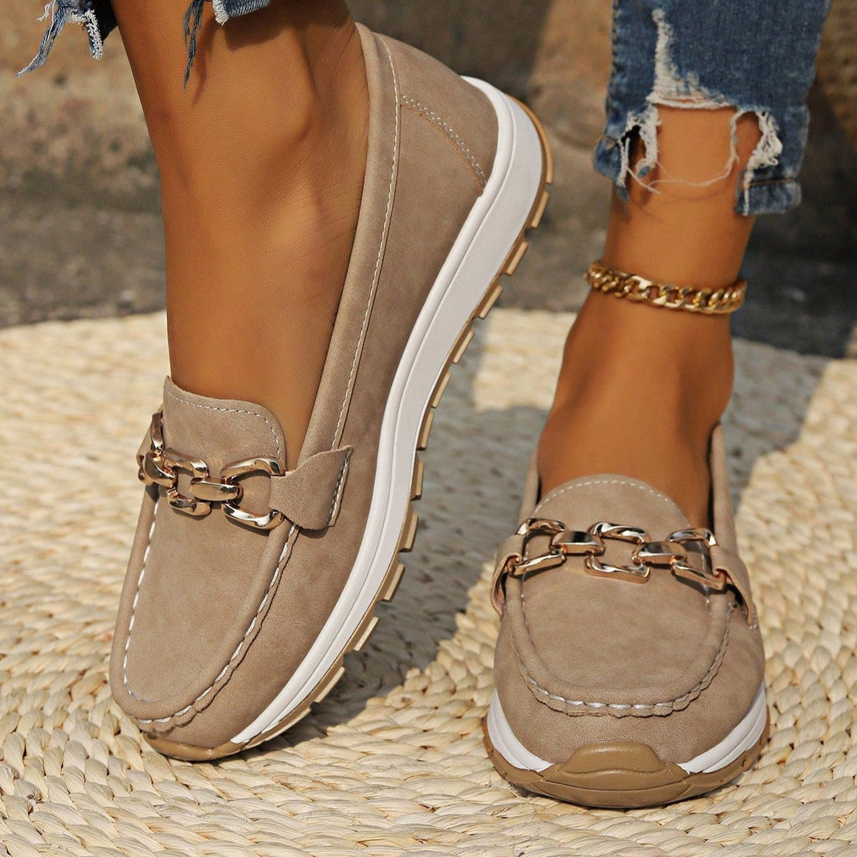 Women's buckle loafers shown in khaki, black, brown and marine blue