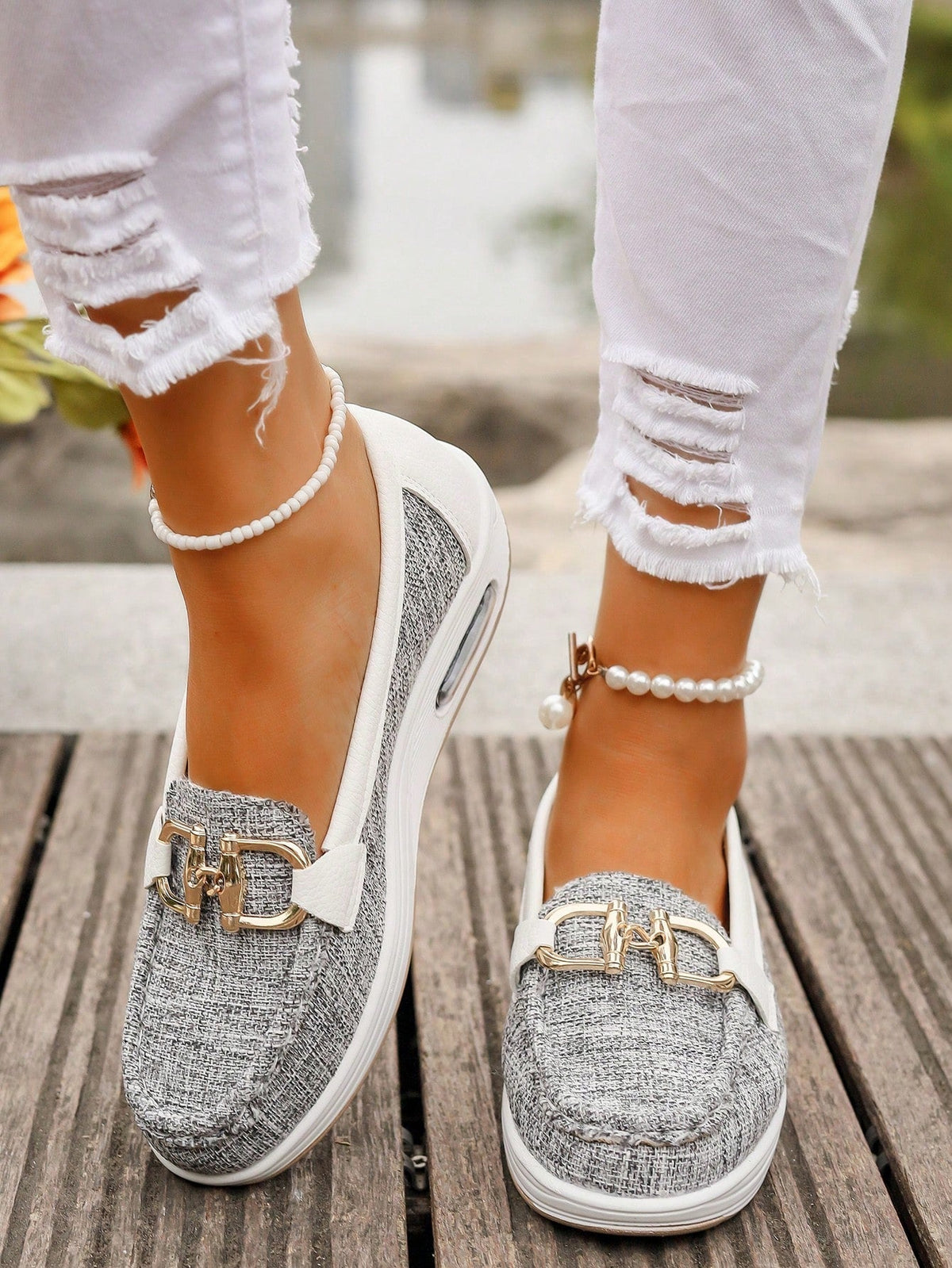 Classic buckle loafers for women shown in khaki, black, blue and grey