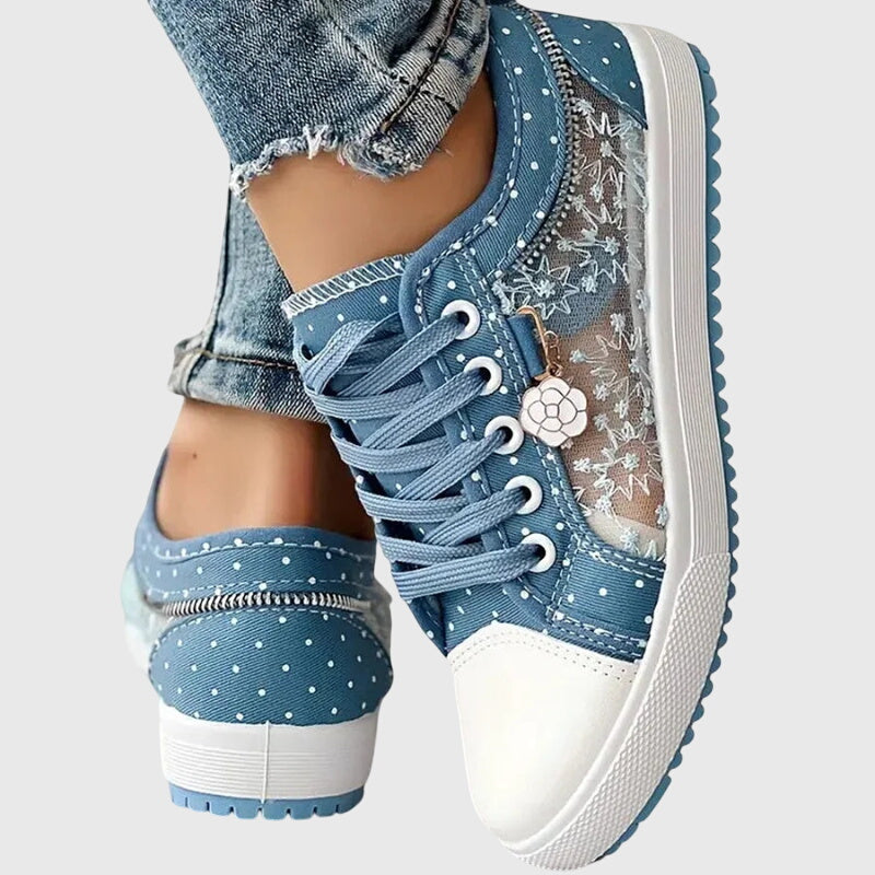 Comfortable lace-up sneakers in soft blue tones for everyday wear