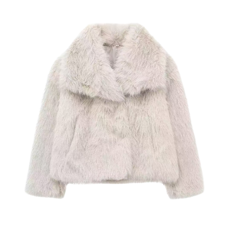 Naomi tailored statement coat shown in neutral tones, styled for everyday wear