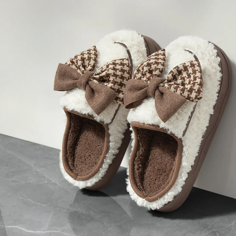 Soft teddy slippers with an oversized bow detail and non-slip sole in brown and white
