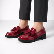 Patent leather bow-detail loafers with a low block heel and round toe