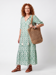 Ilara green pattern V-neck tassel midi dress with a relaxed silhouette and pockets