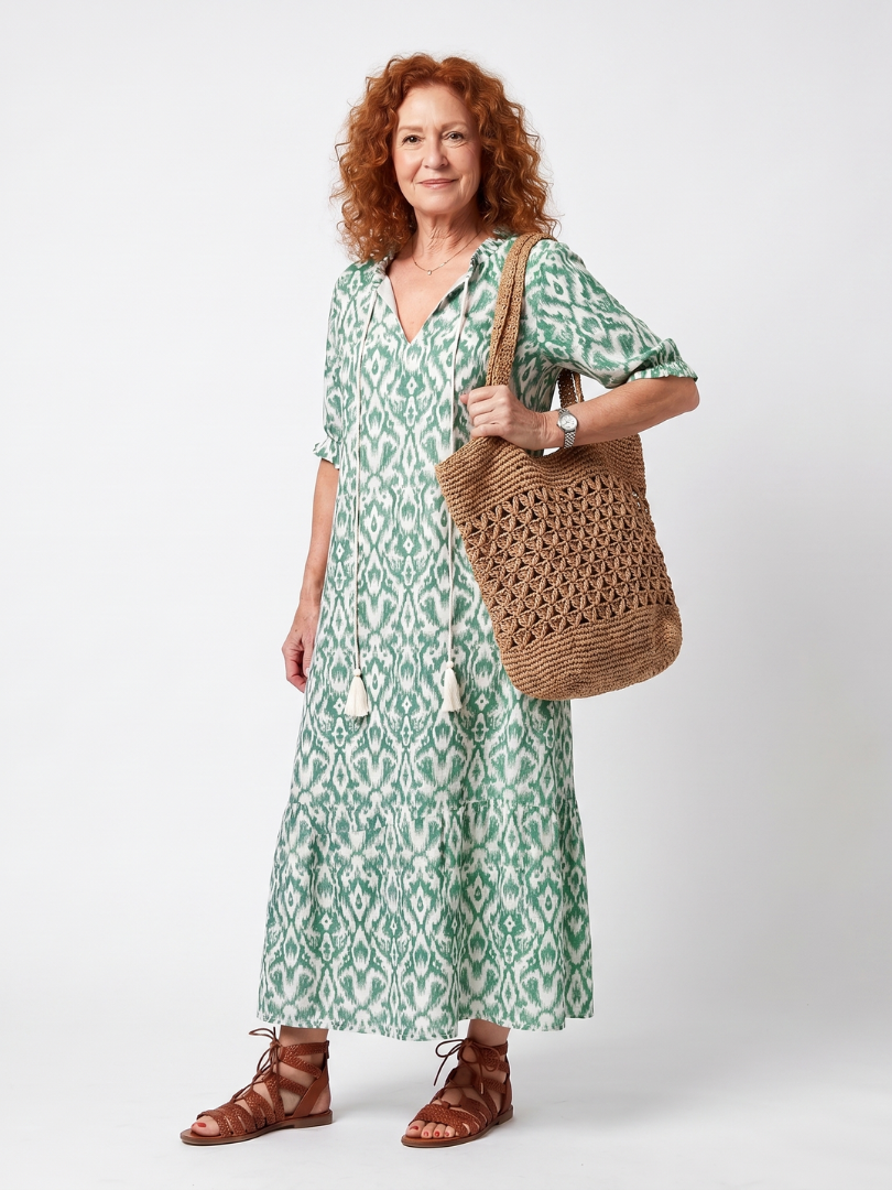 Ilara green pattern V-neck tassel midi dress with a relaxed silhouette and pockets