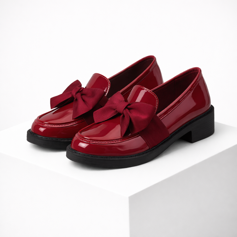 Patent leather bow-detail loafers with a low block heel and round toe