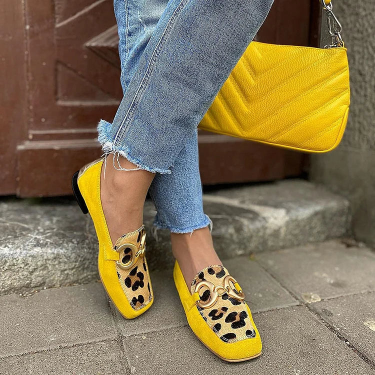 Yellow animal print women's loafers with a classic slip-on silhouette