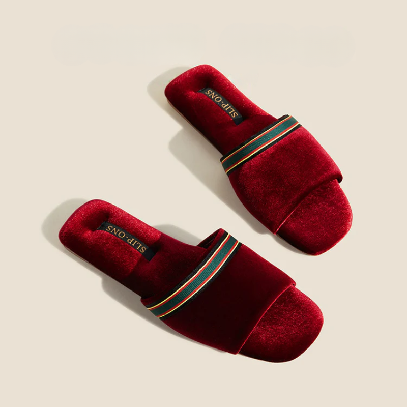 Velvety open-toe slippers with ribbon detailing in red, green and brown