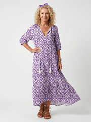 Purple printed tassel tie midi dress with a relaxed silhouette and pockets