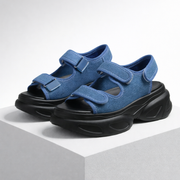 Chunky platform sandals with open toe and adjustable velcro straps in leopard, black and blue