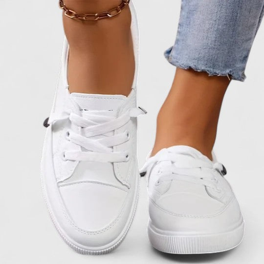 Comfortable slip-on everyday shoes shown in white, black and beige