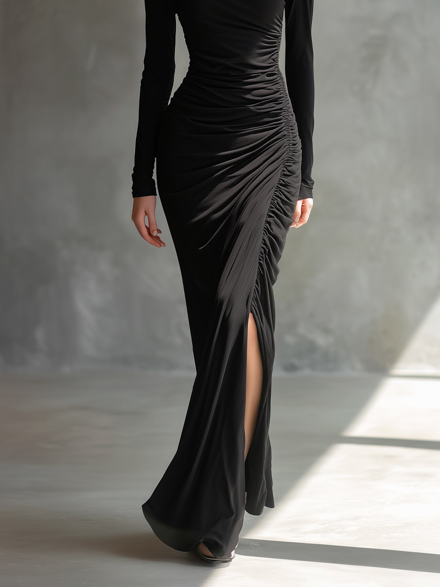 Aggie black off-shoulder jersey dress with a flattering elegant silhouette