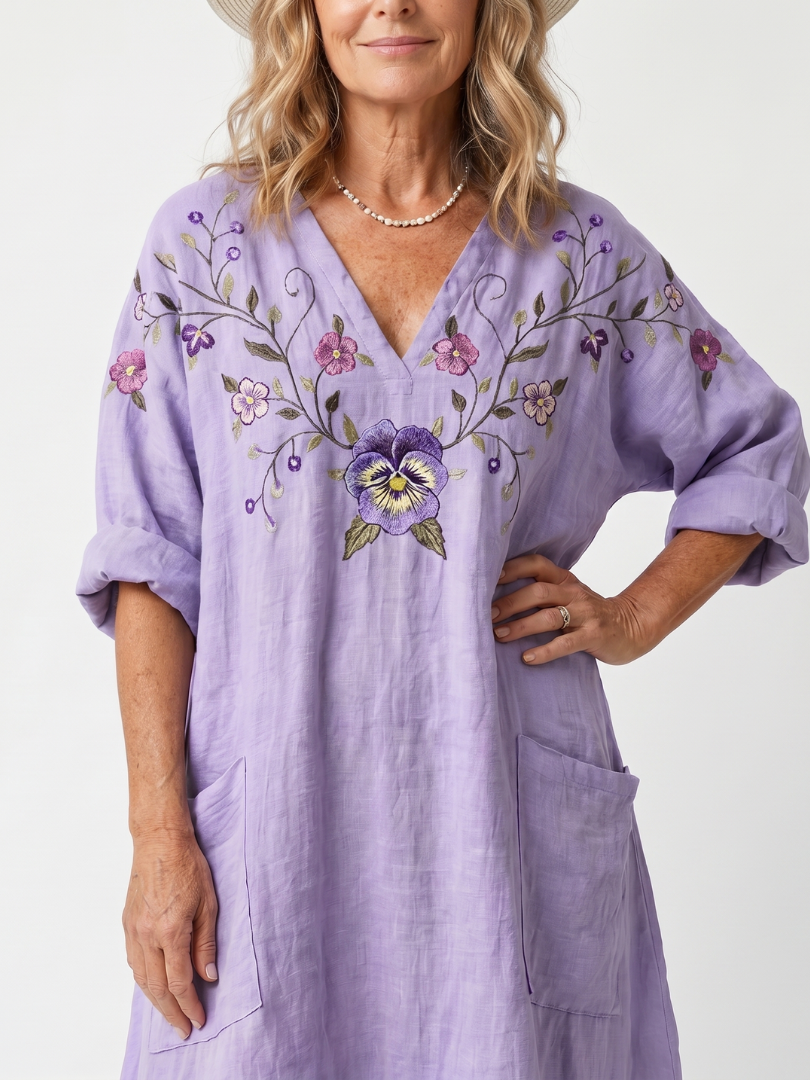 Purple floral embroidered oversized midi dress with pockets and a relaxed silhouette