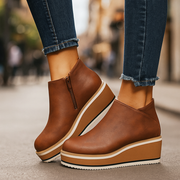 Tilly lace-up platform boots shown in dark brown, deep blue, light khaki and classic black