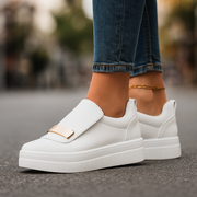 Lottie heritage platform sneakers shown in white, navy, black and olive green