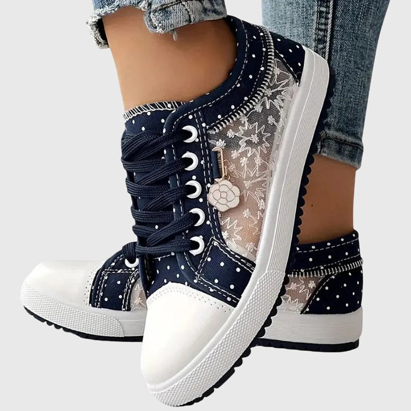 Comfortable lace-up sneakers in soft blue tones for everyday wear
