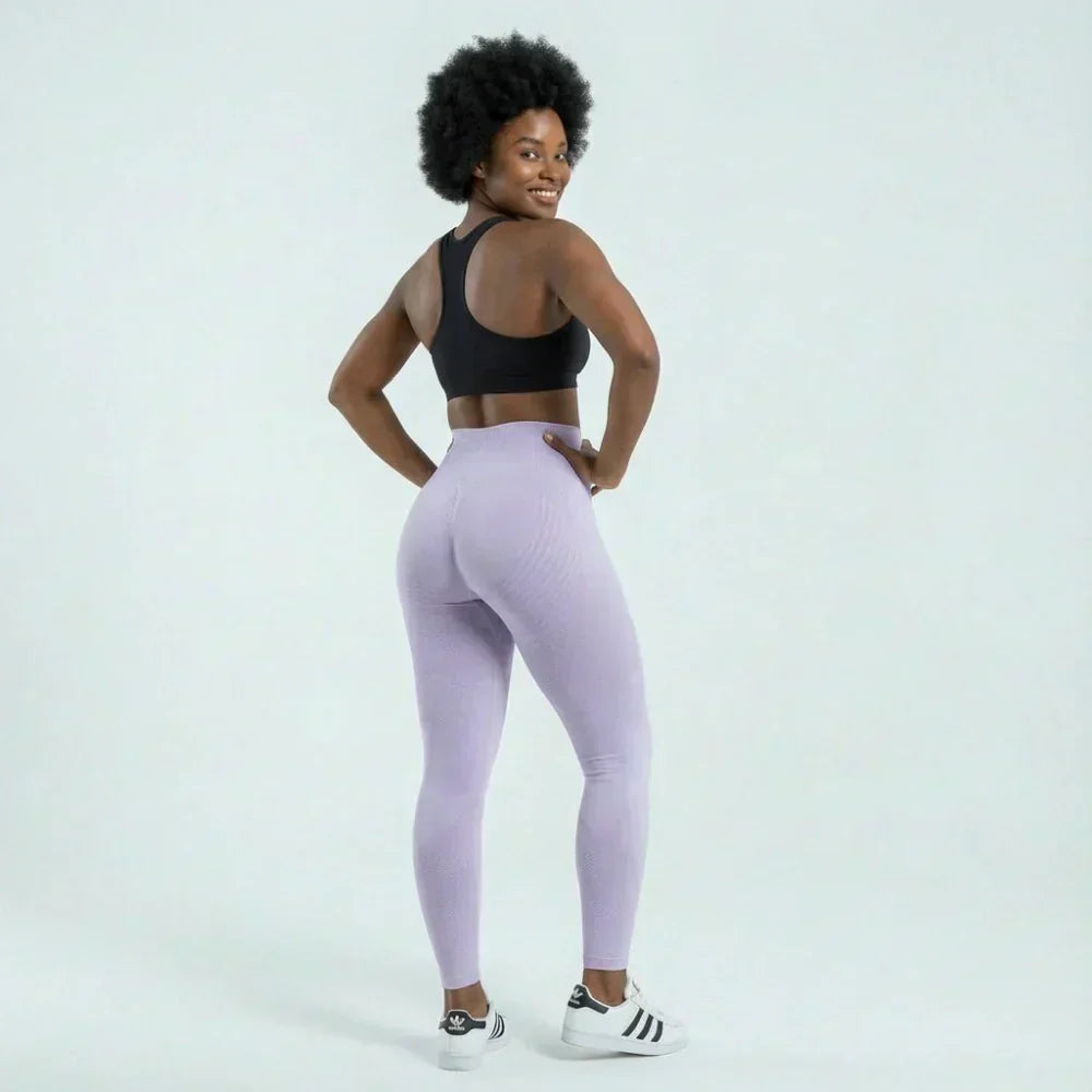 Clara full-length sculpting legging shown in light purple and pink