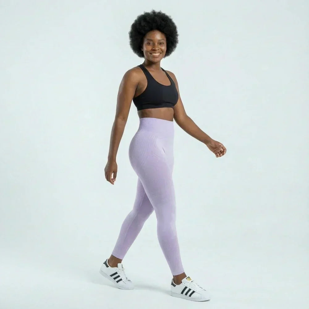 Clara full-length sculpting legging shown in light purple and pink
