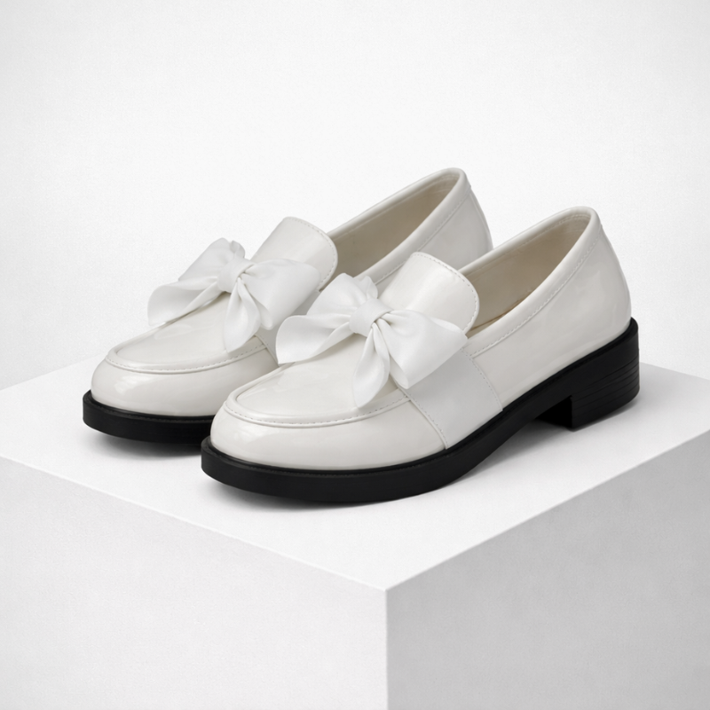 Patent leather bow-detail loafers with a low block heel and round toe