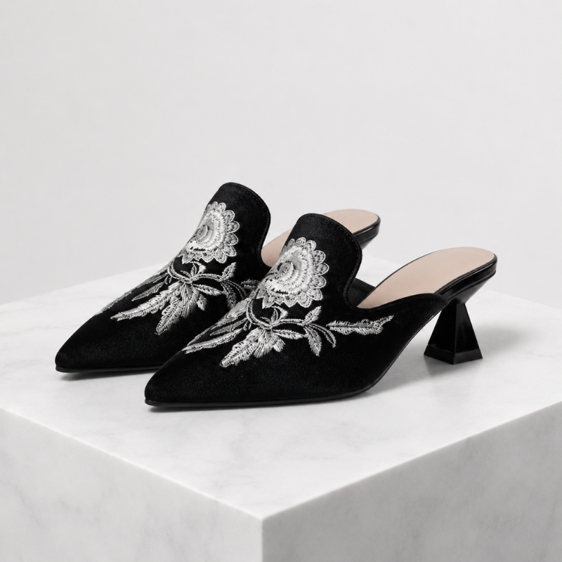 Embroidered velvet pointed-toe mules with floral detail and low flared heel