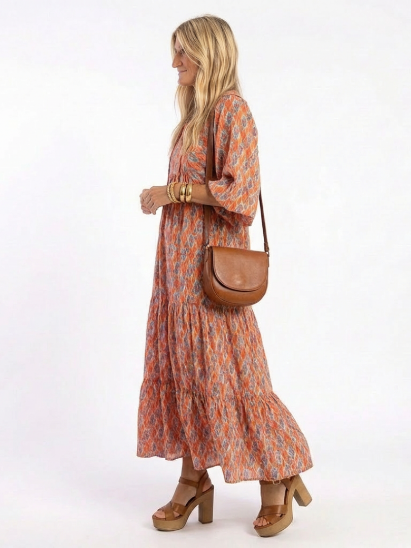 Beige geometric print v-neck tiered midi dress with relaxed silhouette and pockets