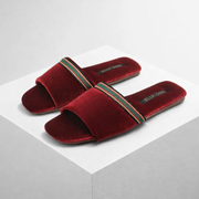Velvety open-toe slippers with ribbon detailing in red, green and brown