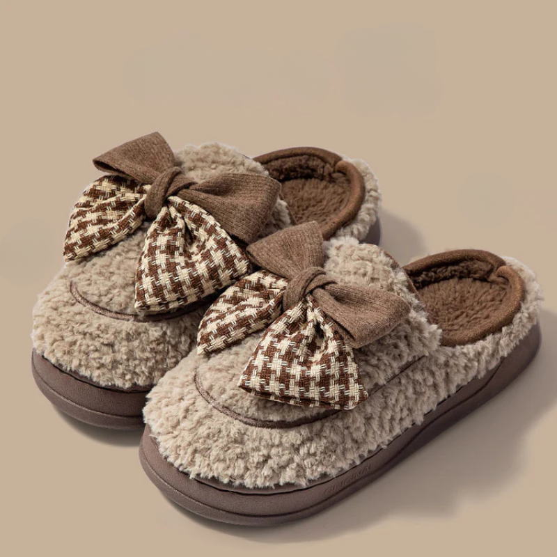 Soft teddy slippers with an oversized bow detail and non-slip sole in brown and white
