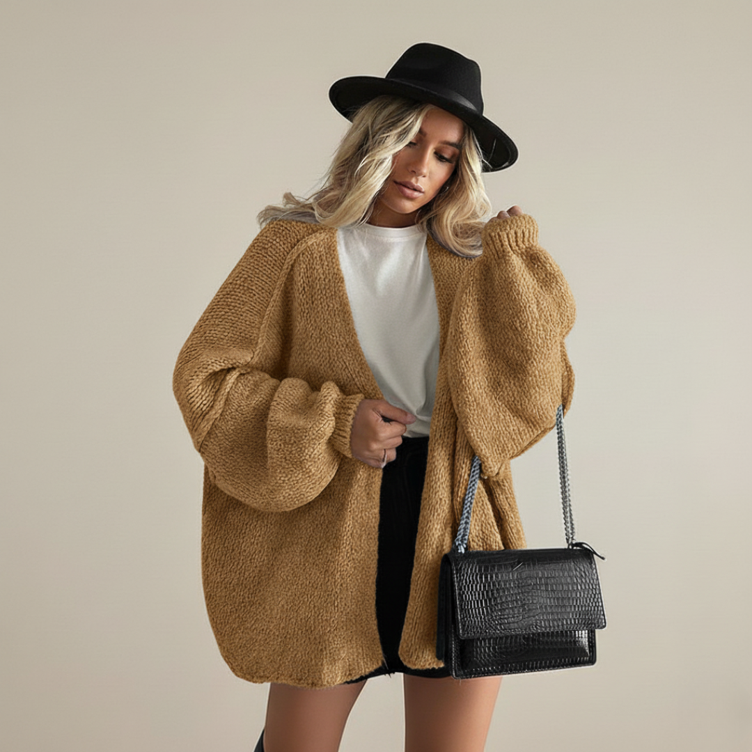 Oversized relaxed knit cardigan with dropped shoulders in a neutral colour