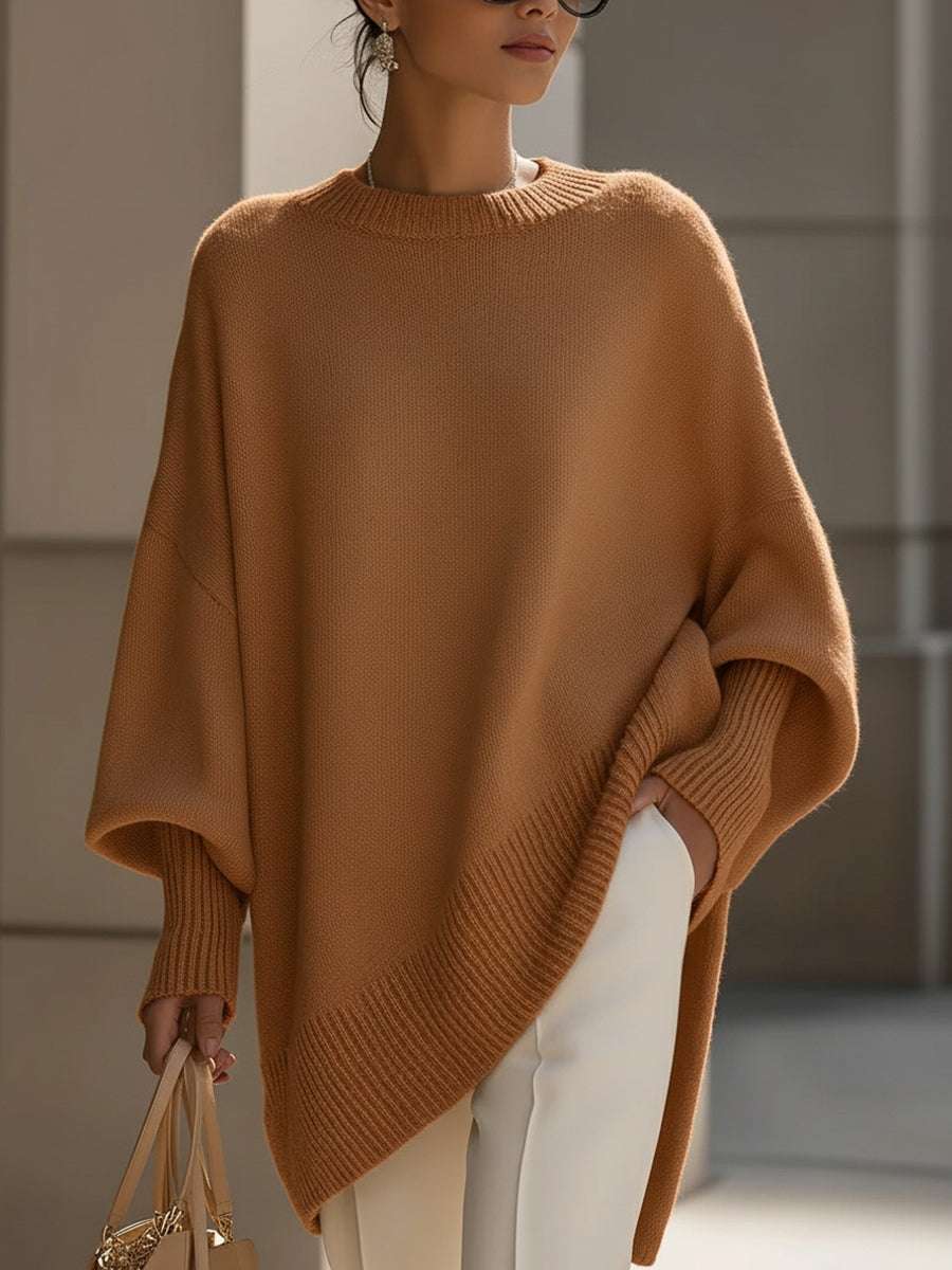 Elodie oversized wool-blend jumper with dropped shoulders, ribbed cuffs and asymmetric hem