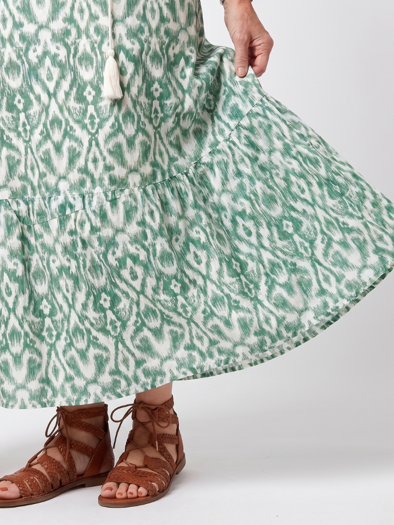 Ilara green pattern V-neck tassel midi dress with a relaxed silhouette and pockets