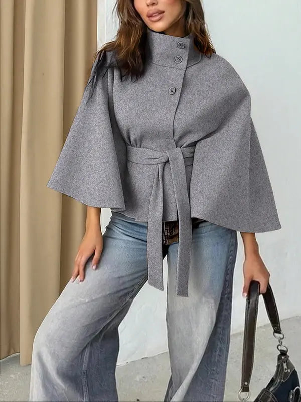 Thelma front buckle belted coat with tailored waist, shown in a neutral tone