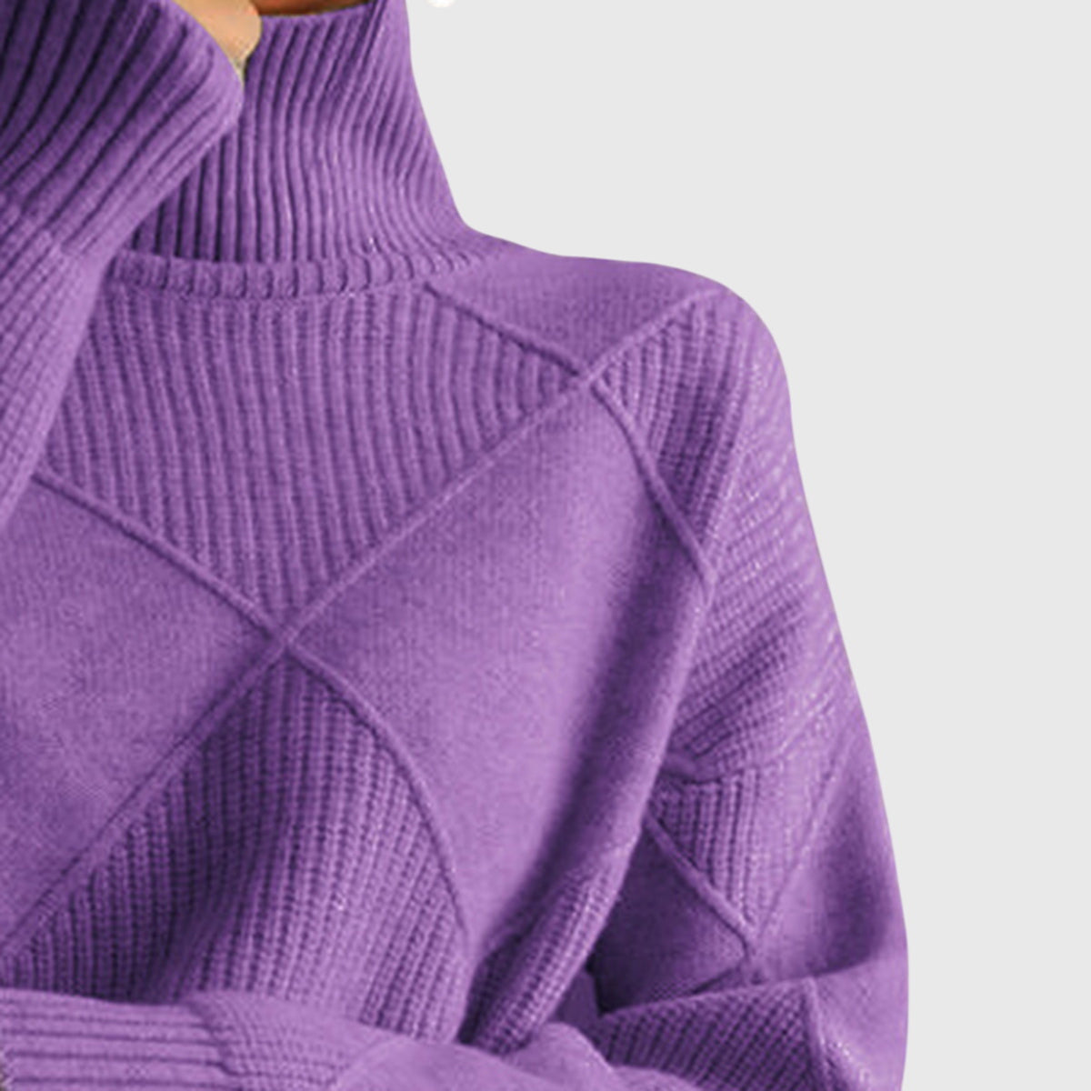 Angela relaxed-fit turtleneck jumper with subtle geometric knit pattern and ribbed cuffs