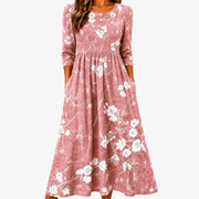 Bree blush floral summer dress with a lightweight flowing silhouette and pockets