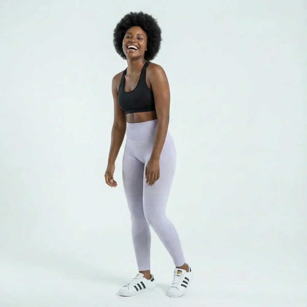 Clara full-length sculpting legging shown in light purple and pink
